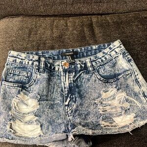 These are Forever 21 Jean shorts in a size 27.